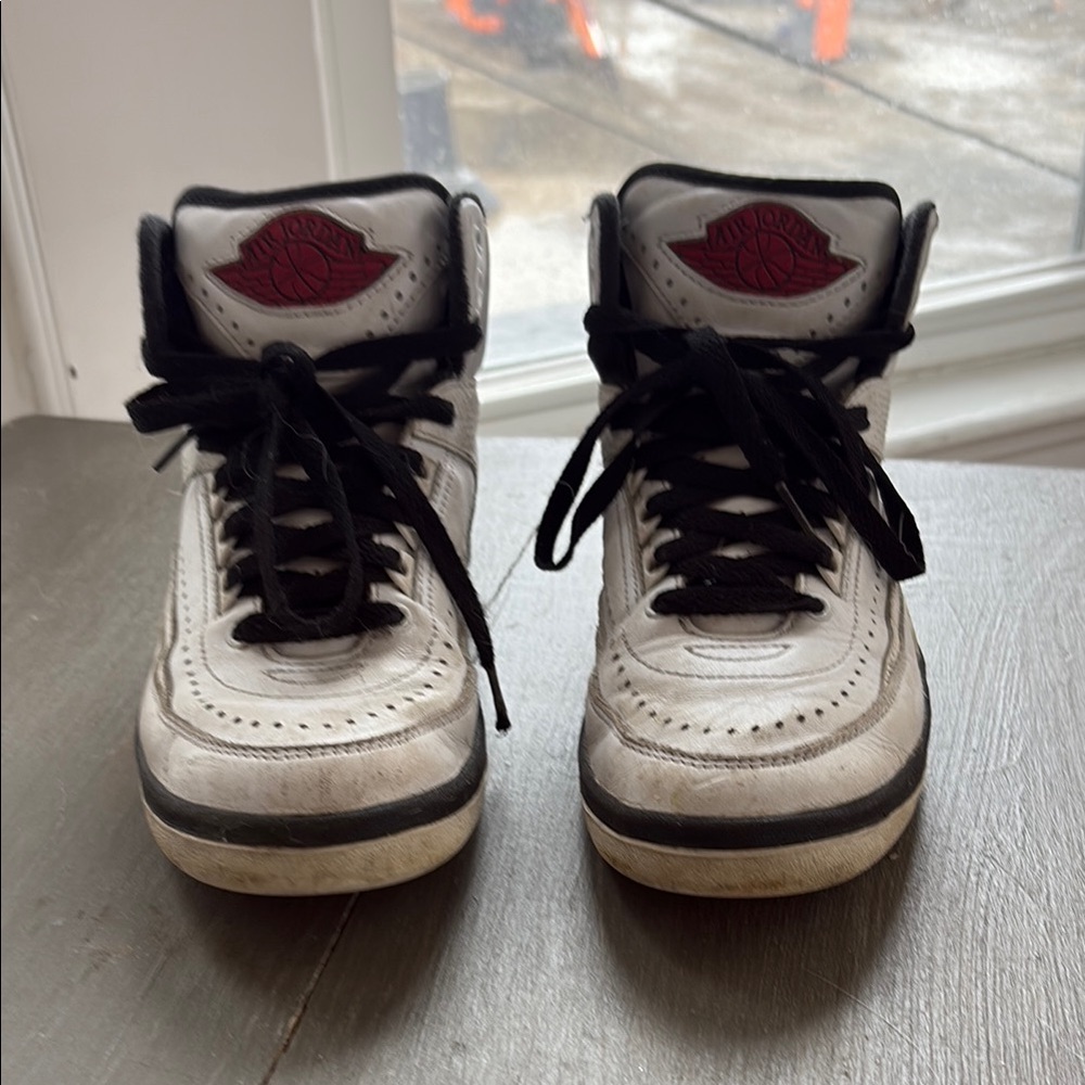 Jordan Women's Black and White Sneakers with Red Highlights